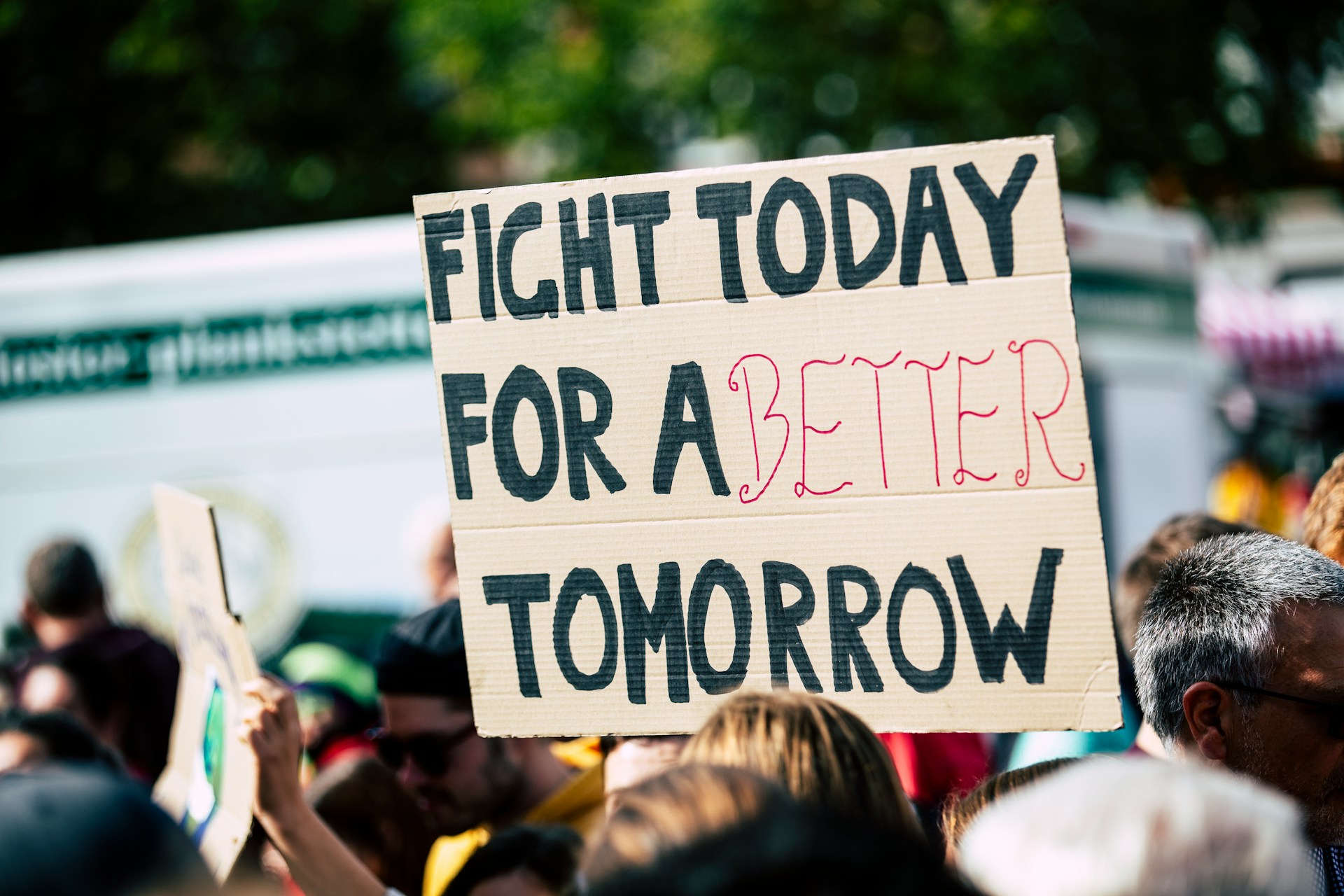 Protest placard with the words ‘Fight today for a better tomorrow’.